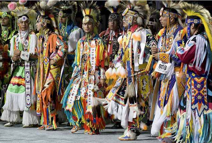 Crow Grass Dancers performing at a fair and rodeo in Montana.