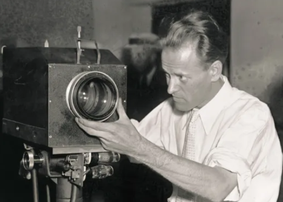 Philo Farnsworth adjusting one of his early experimental television cameras