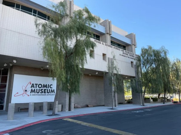 Modern exterior view of the National Atomic Testing Museum building and entrance sign on East Flamingo Road in Las Vegas.