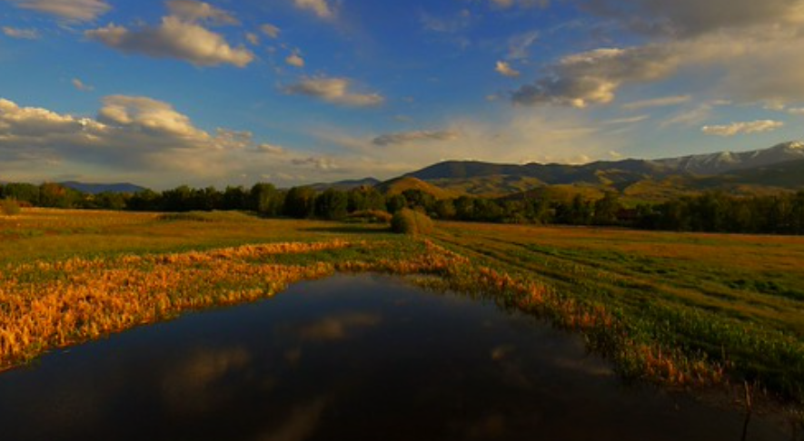 Color photograph of the Lemhi River Valley (Lemhi County, Idaho) at Sunset.