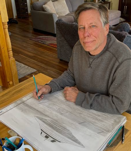 Bob Lazar sketching the S-4 Sport Model flying saucer on a drafting pad.