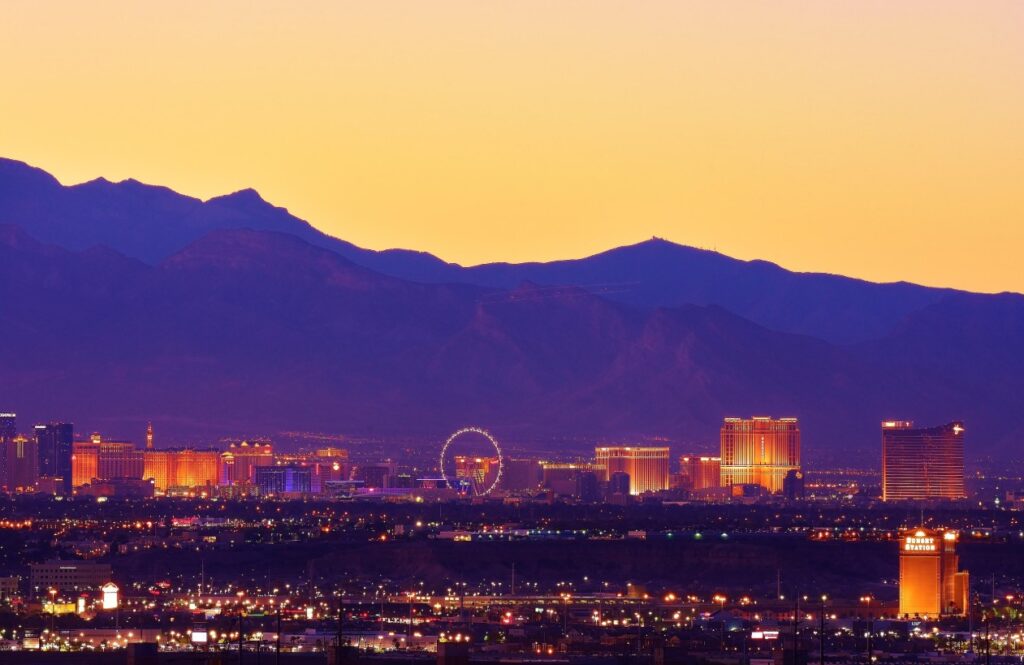 Las Vegas skyline at sunset in Nevada, showing city buildings beneath the evening sky near the region associated with Area 51.