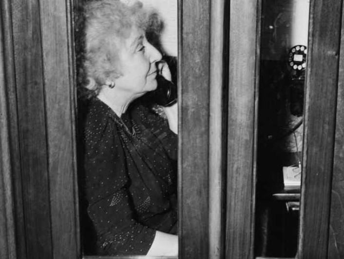 Jeannette Rankin in a Capitol telephone booth on December 8, 1941.