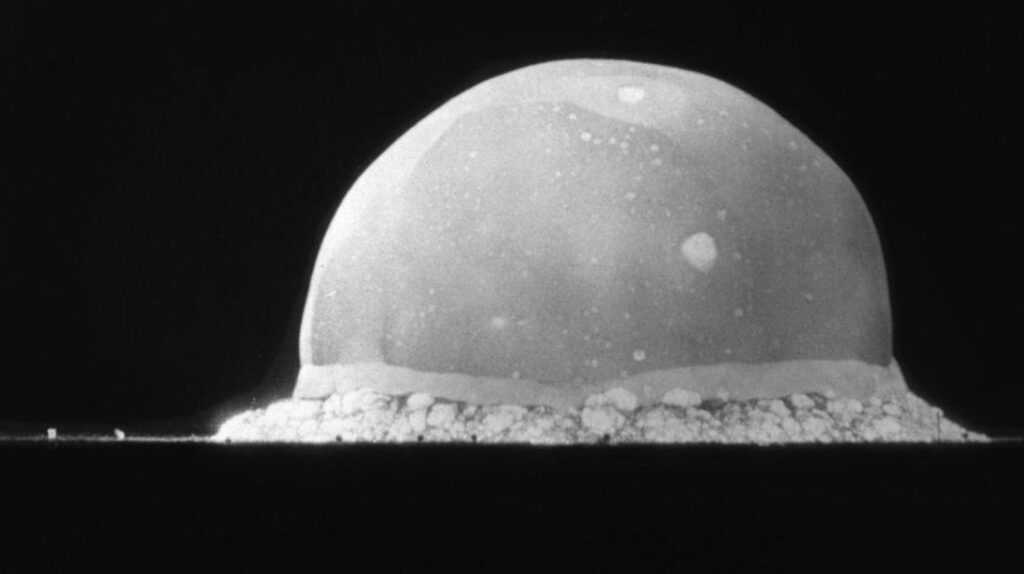 Fireball from the Trinity atomic bomb test in New Mexico on July 16, 1945, showing the explosion that created Trinitite glass.