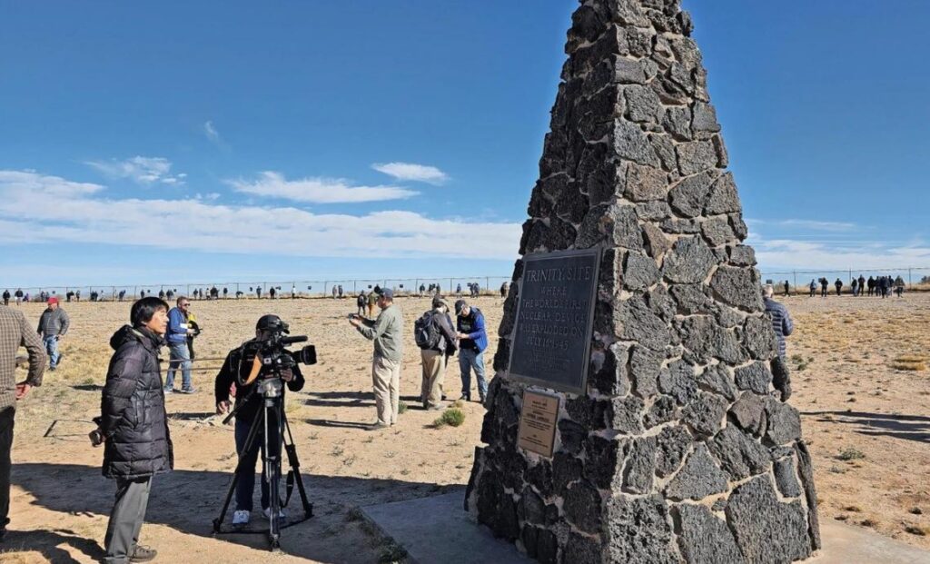 Visitors gather at the Trinity Site ground zero monument in New Mexico, where the first atomic bomb test created Trinitite glass in 1945.