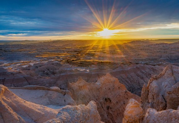 Wyoming badlands at sunset where dinosaur fossils are found